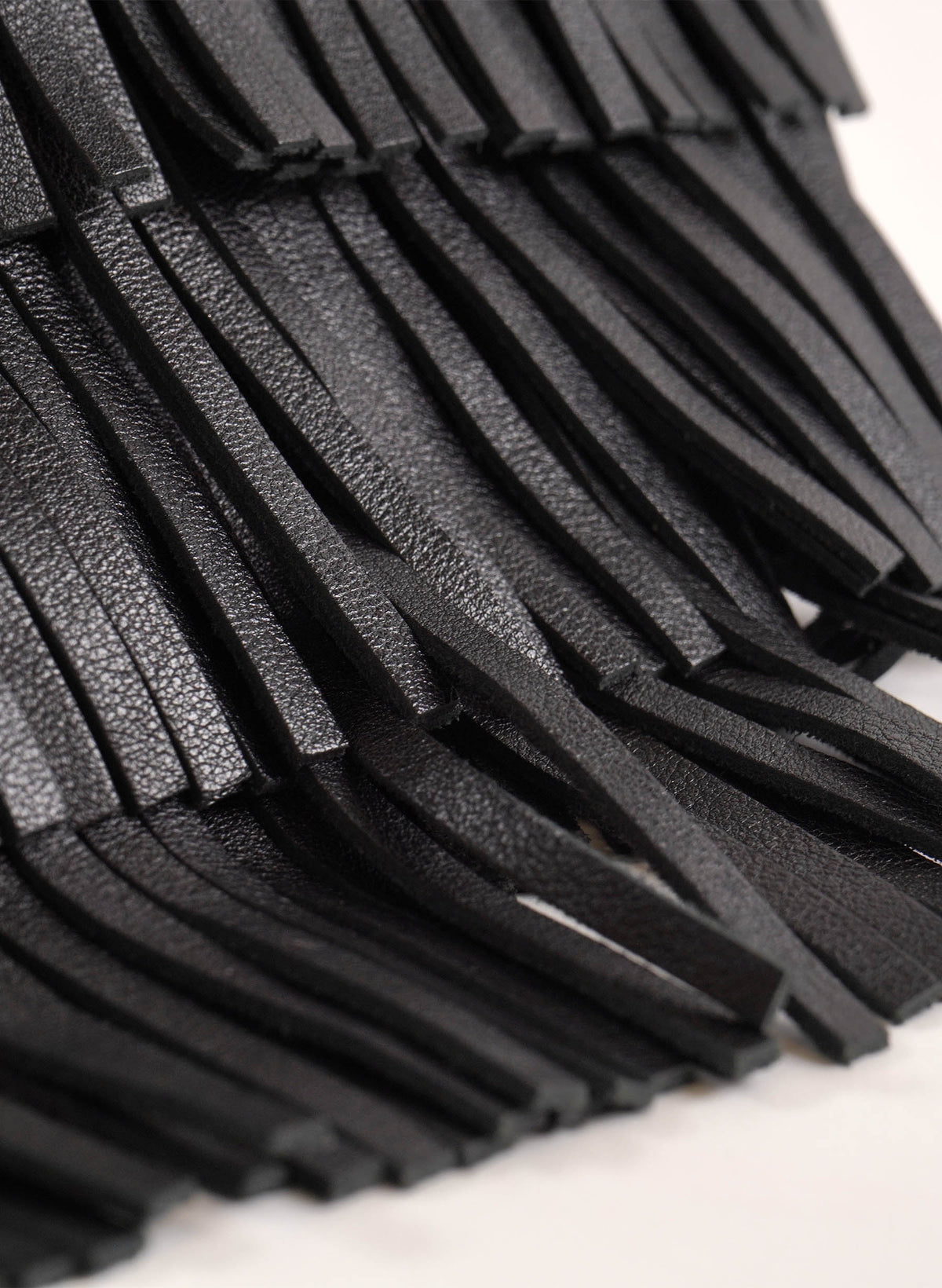 Pochette à franges en cuir Saint Laurent