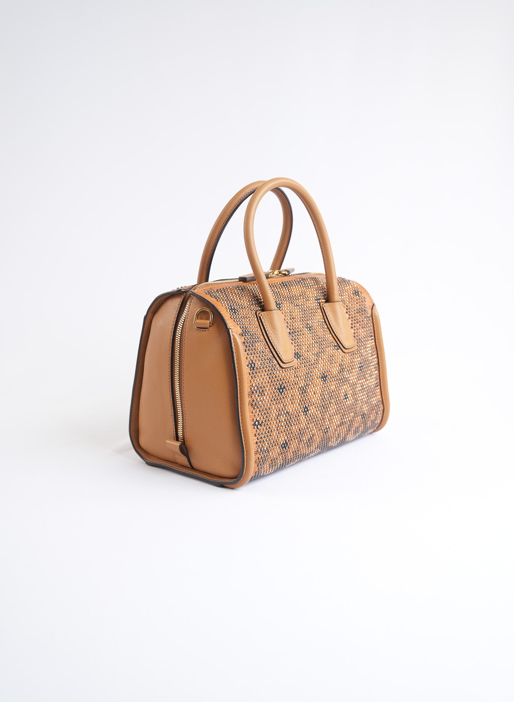 Sac à main clouté en toile enduite MCM