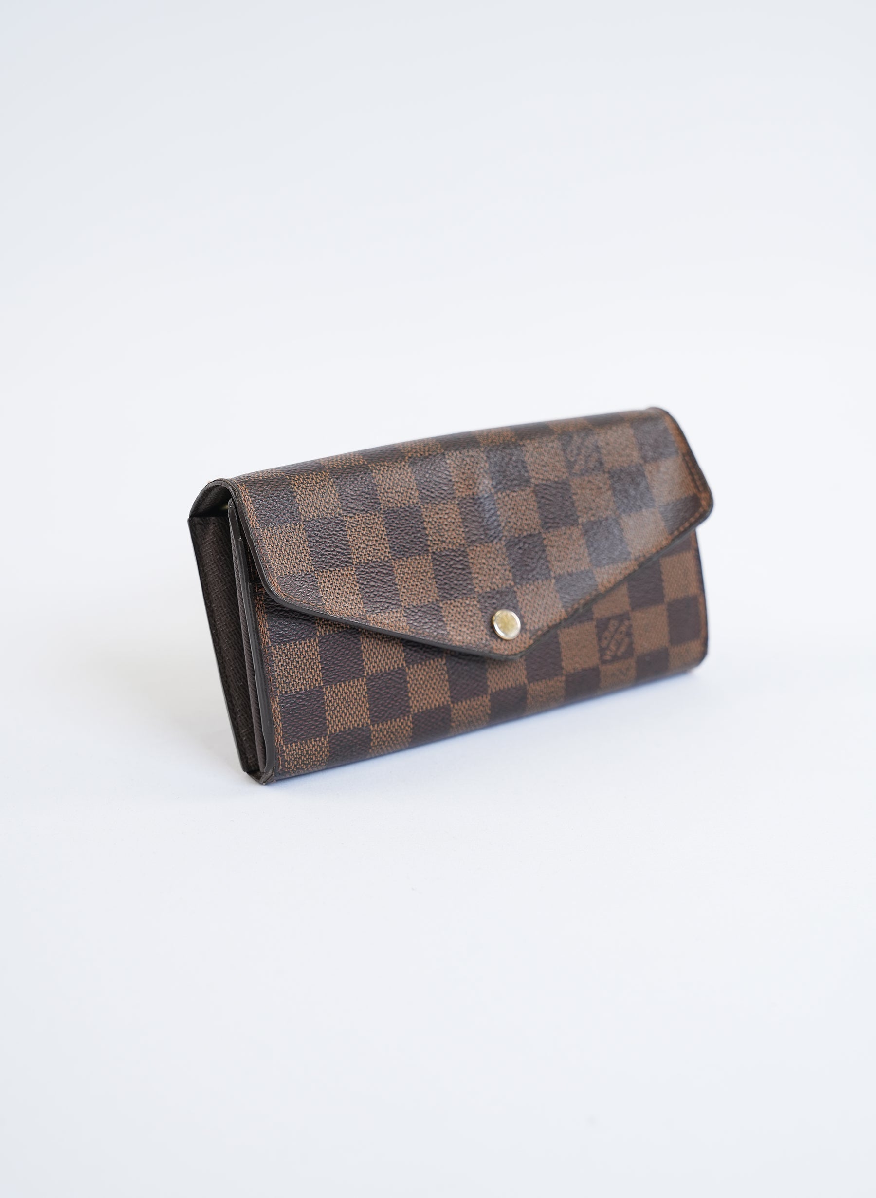 Portefeuille en toile Louis Vuitton NM Damier Ebene