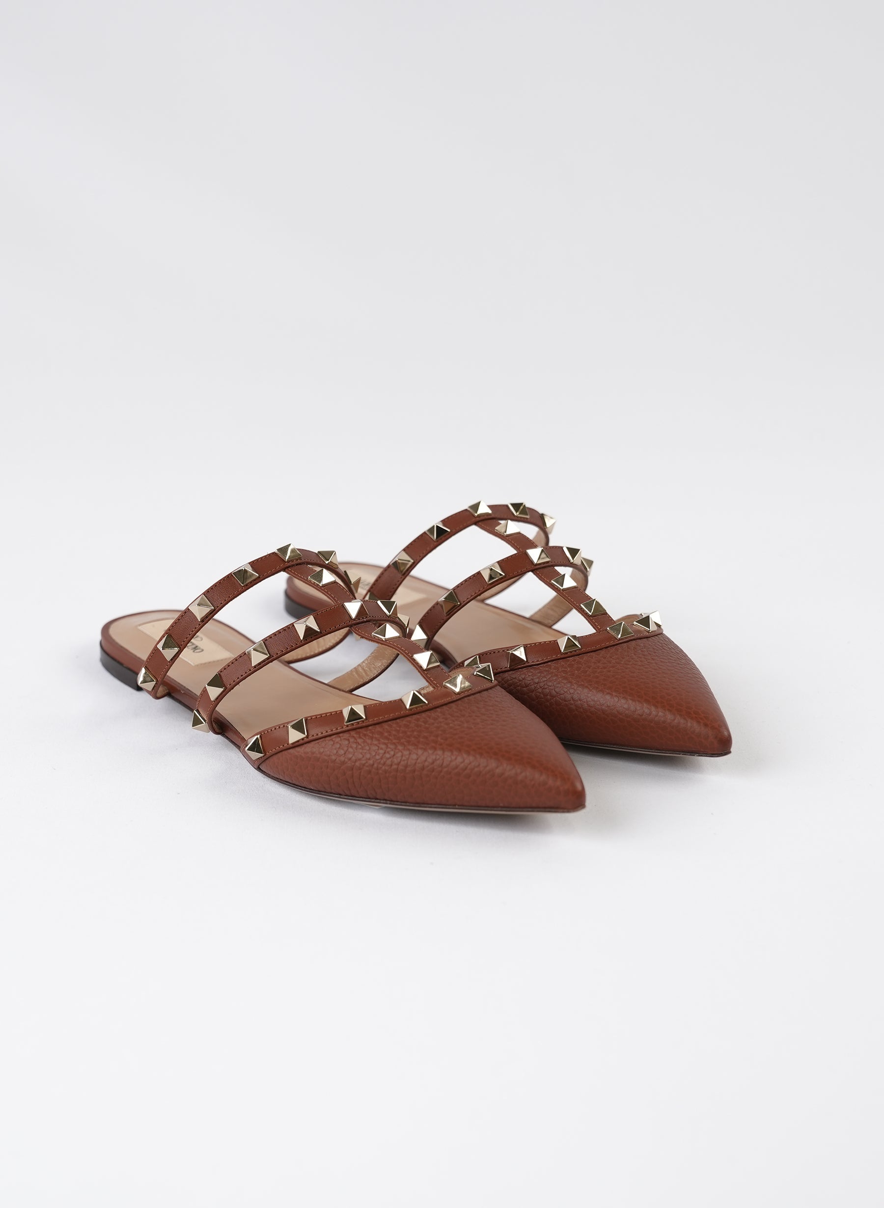 Valentino Garavani Pebbled Calfskin Rockstud Flat Cage Mules