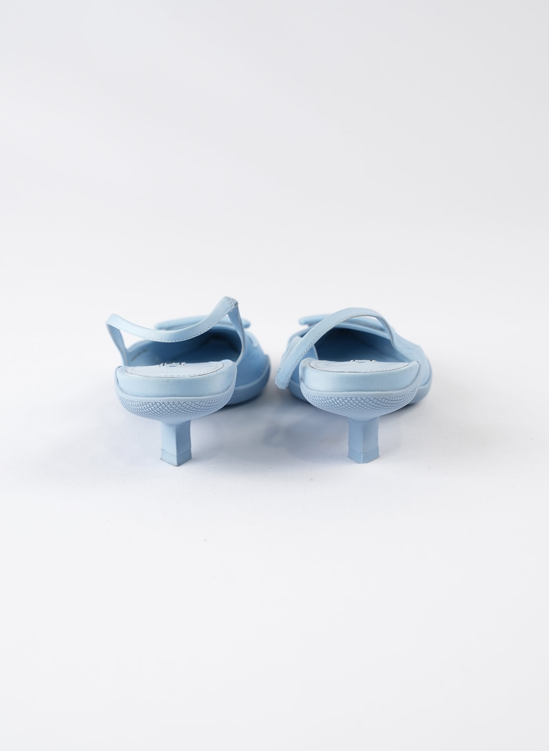 Prada Triangle Logo-Plaque Slingback Pumps