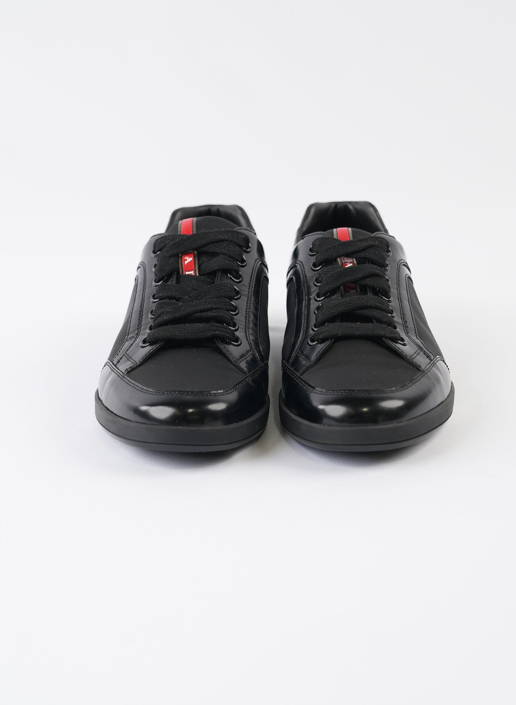 Prada Line Rossa Low Top Black Leather Sneakers