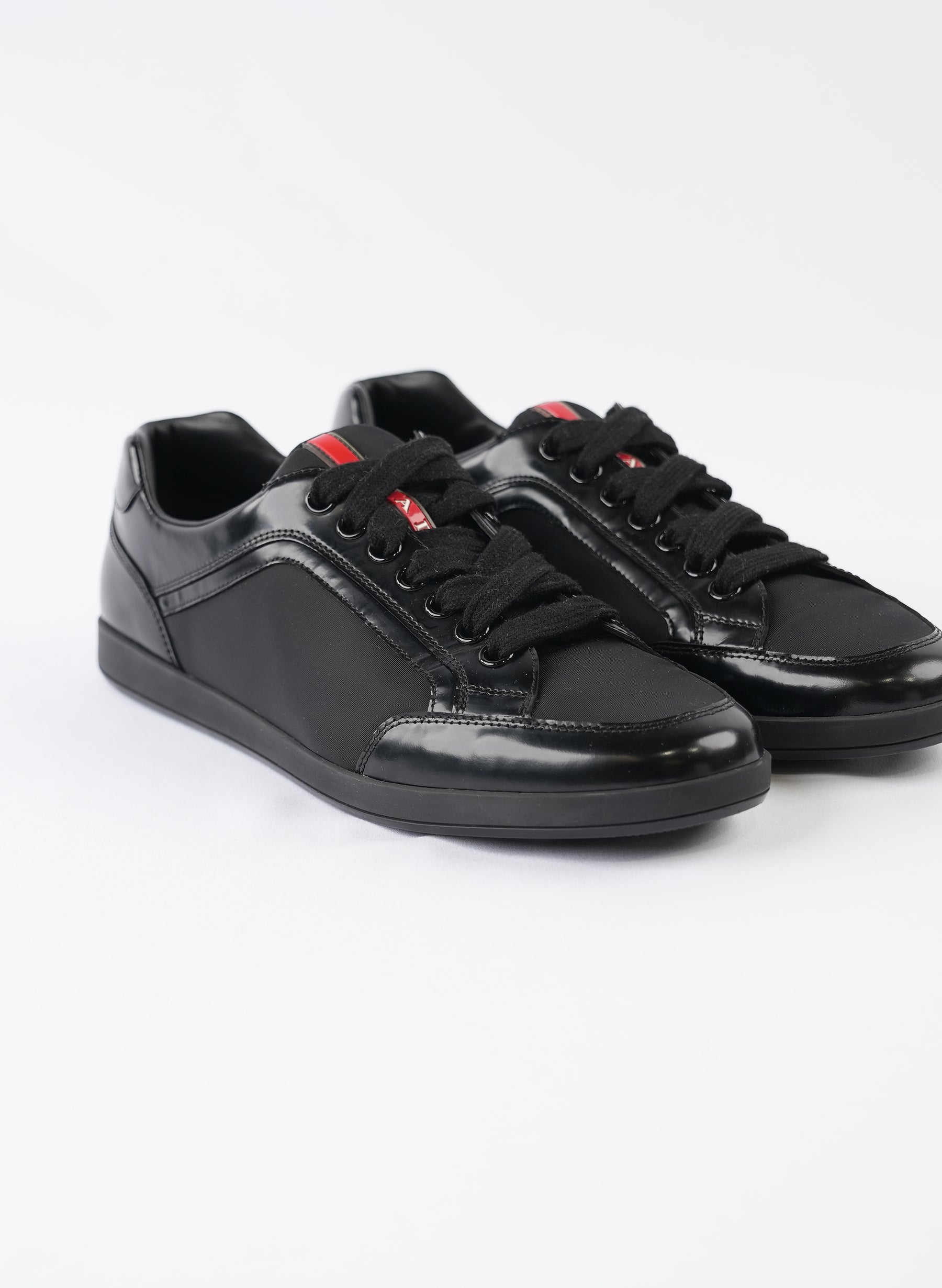 Prada Line Rossa Low Top Black Leather Sneakers