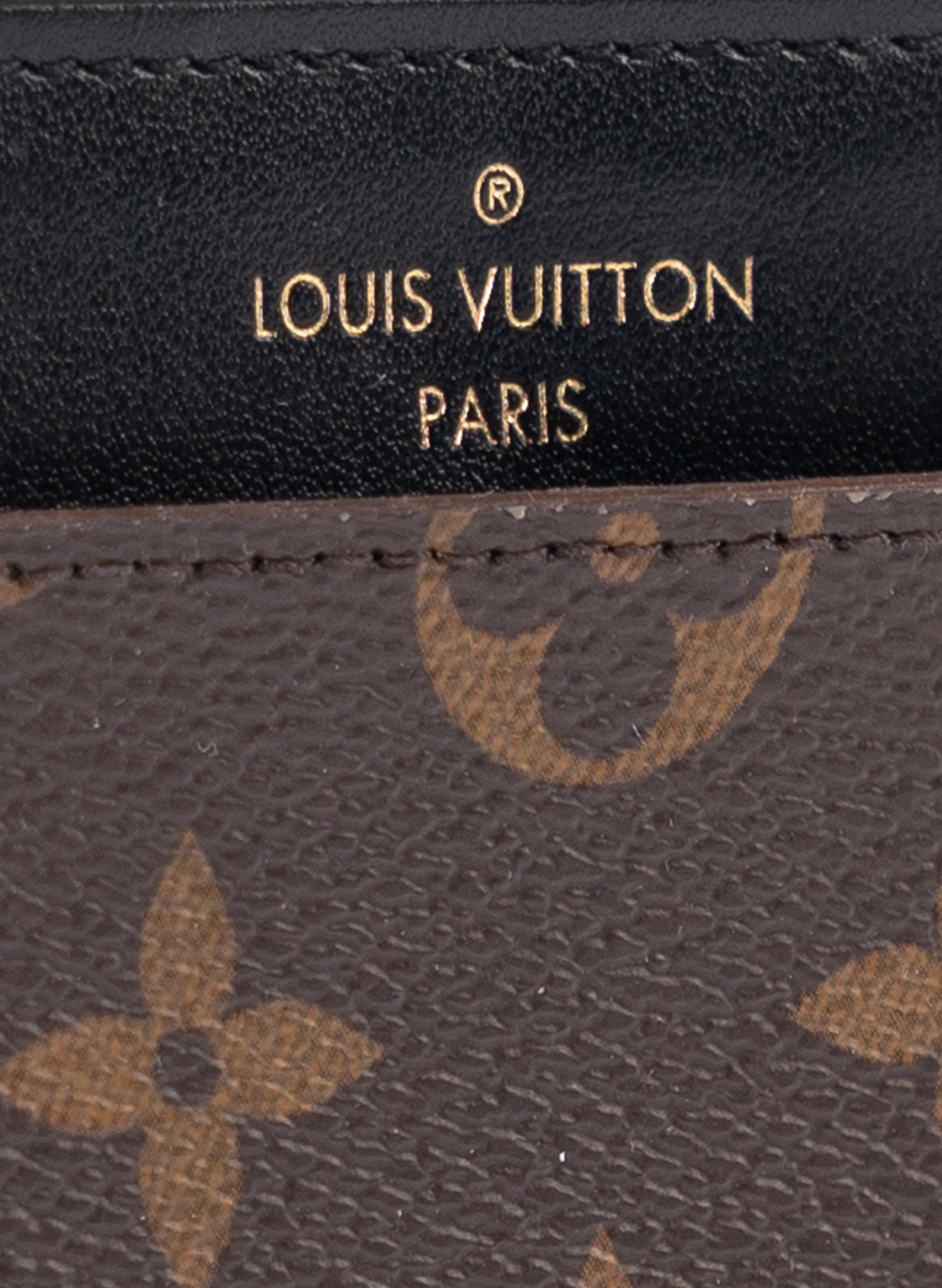 Sac à main fin en toile monogrammée Louis Vuitton