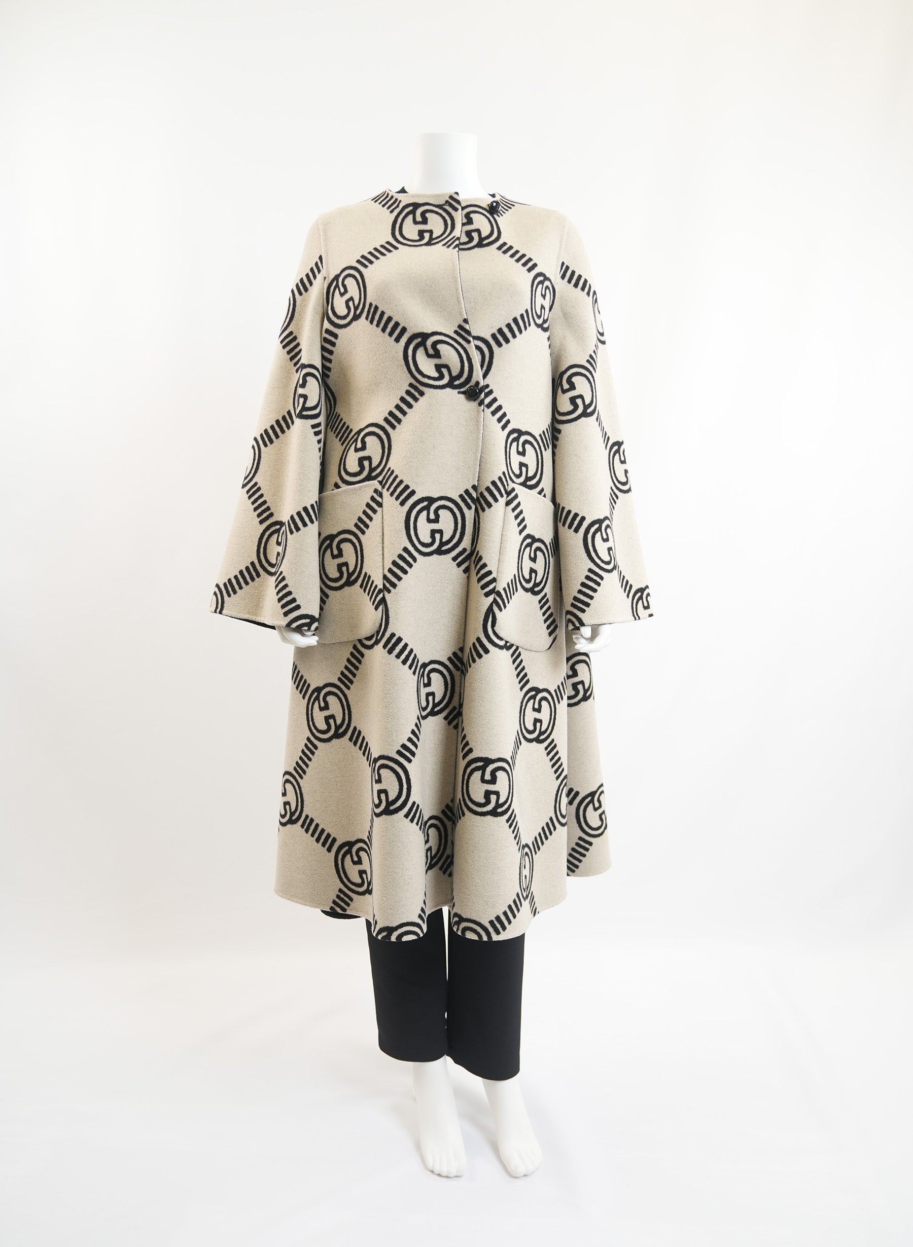 Manteau réversible Gucci à motif GG entrelacé