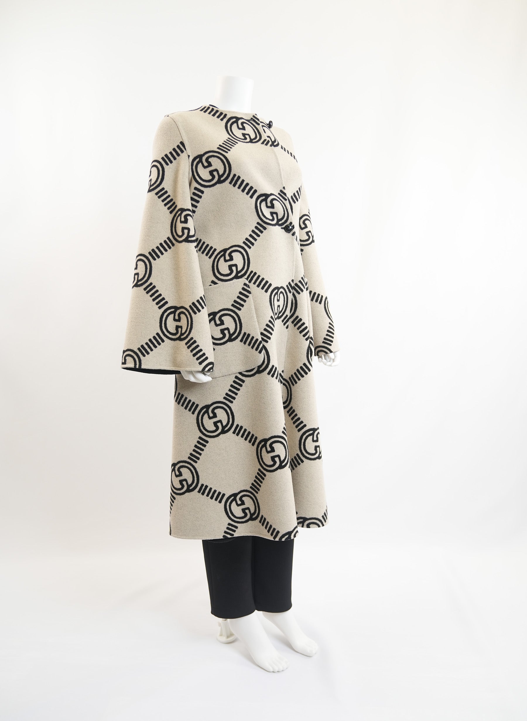 Manteau réversible Gucci à motif GG entrelacé