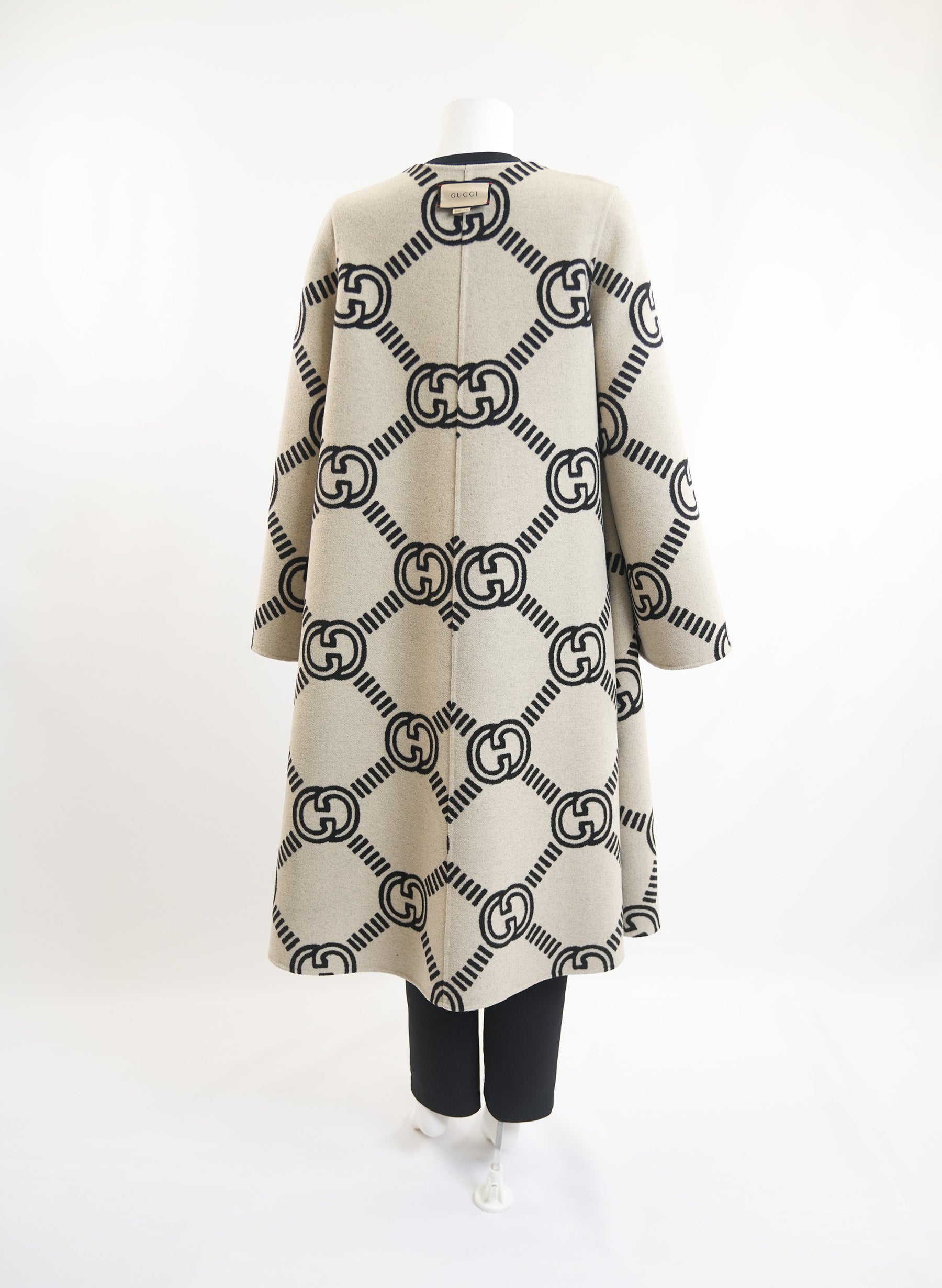 Manteau réversible Gucci à motif GG entrelacé