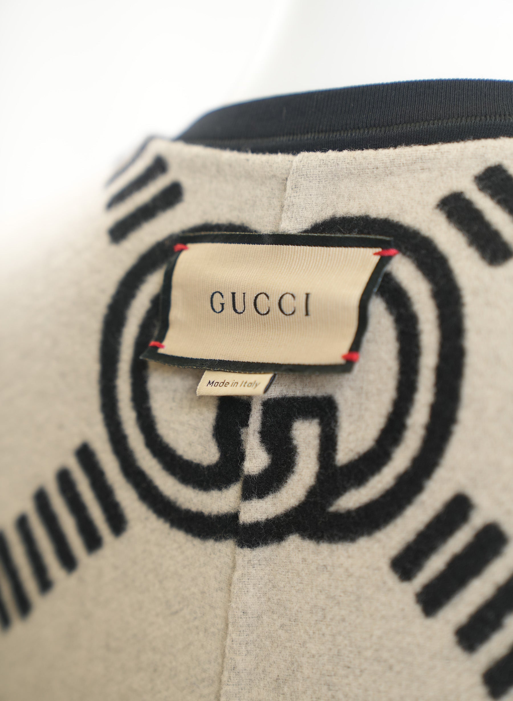 Manteau réversible Gucci à motif GG entrelacé