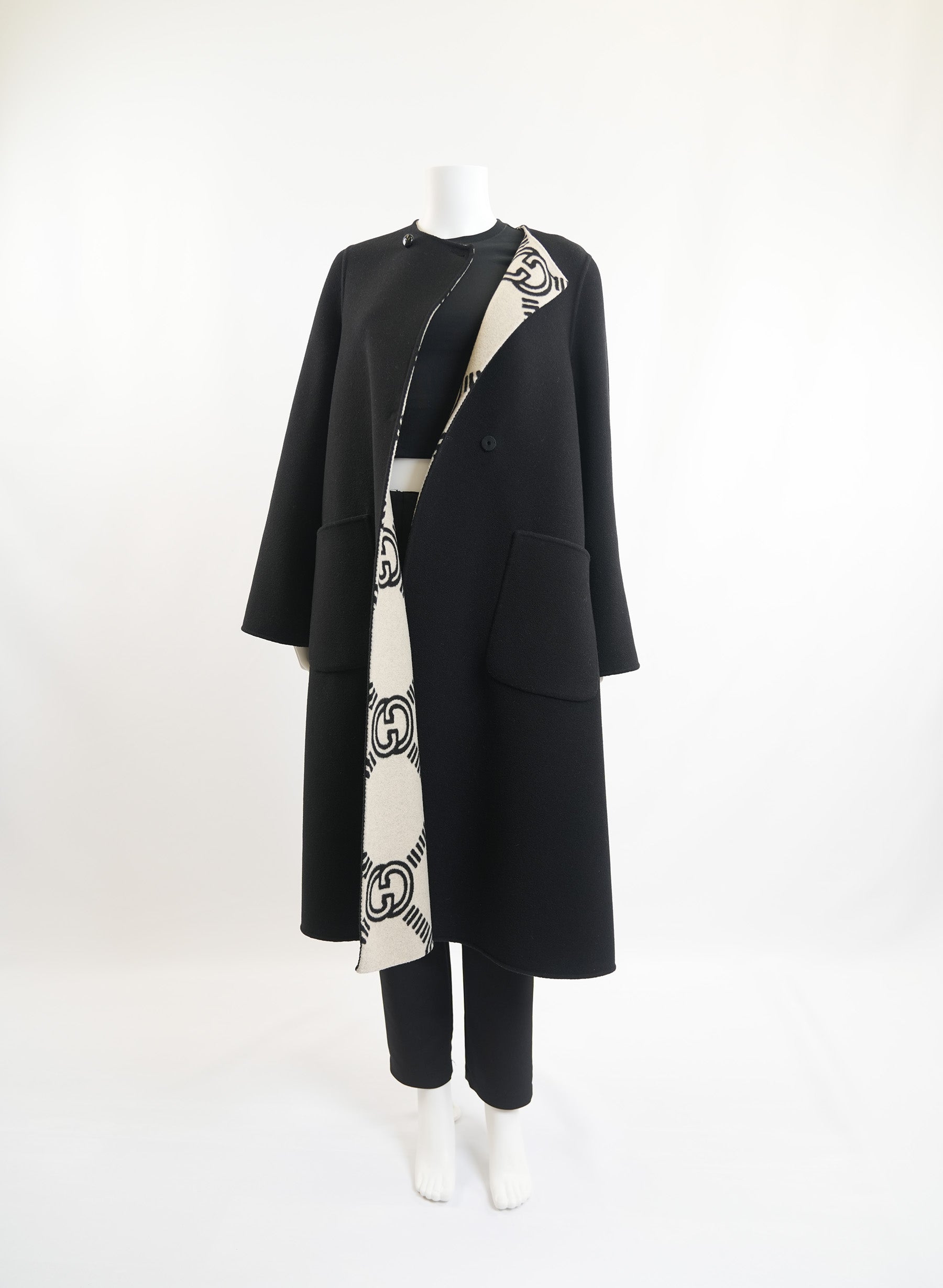 Manteau réversible Gucci à motif GG entrelacé