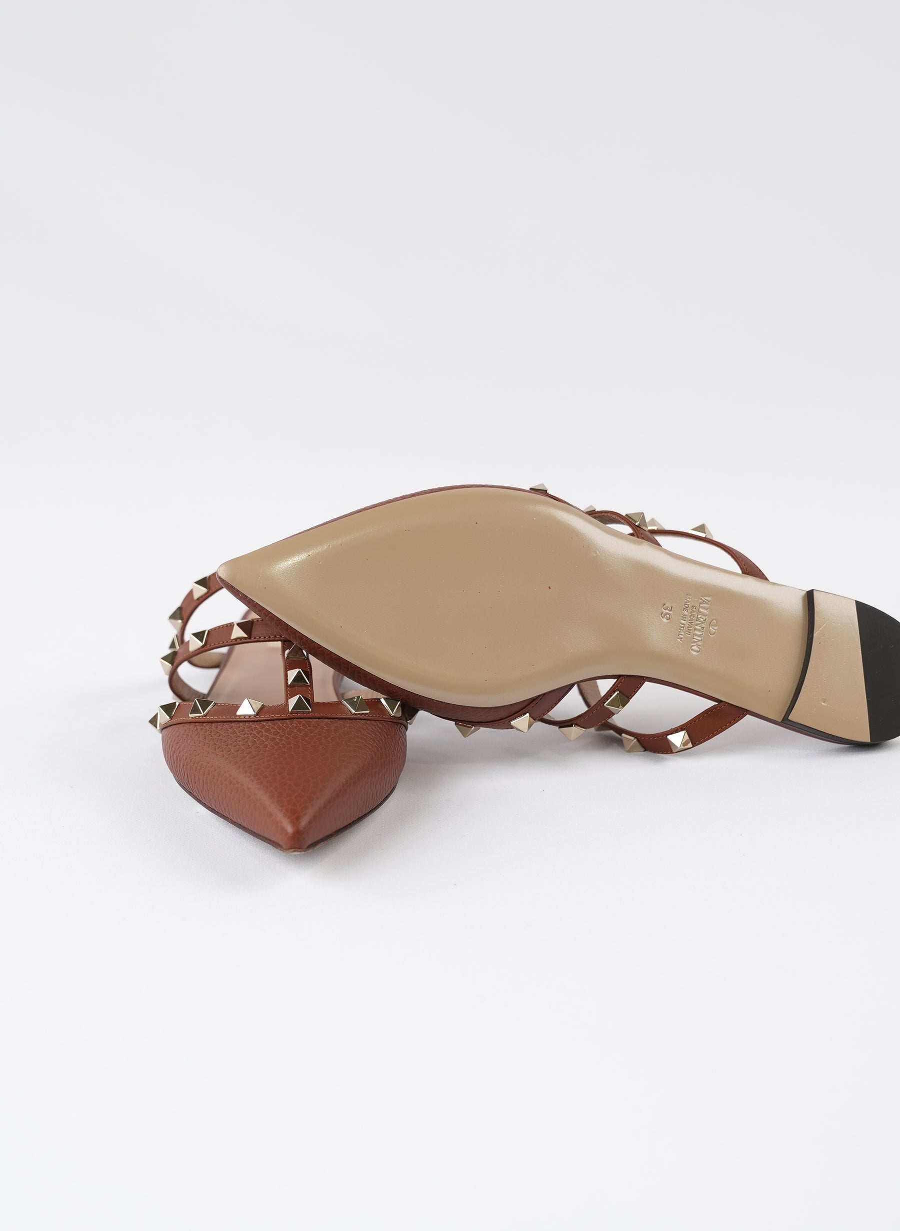 Valentino Garavani Pebbled Calfskin Rockstud Flat Cage Mules